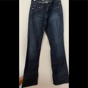 Joe’s blue jeans, fashionably ripped in the back, good condition, size 24